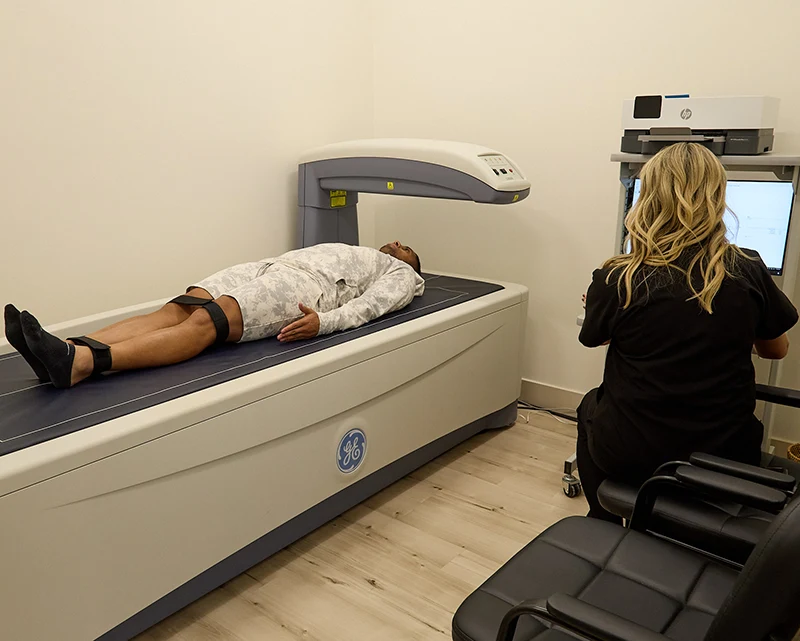 A man receives a full body dexa scan at WOW Clinic